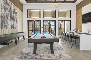 Resident lounge with billiards & shuffleboard